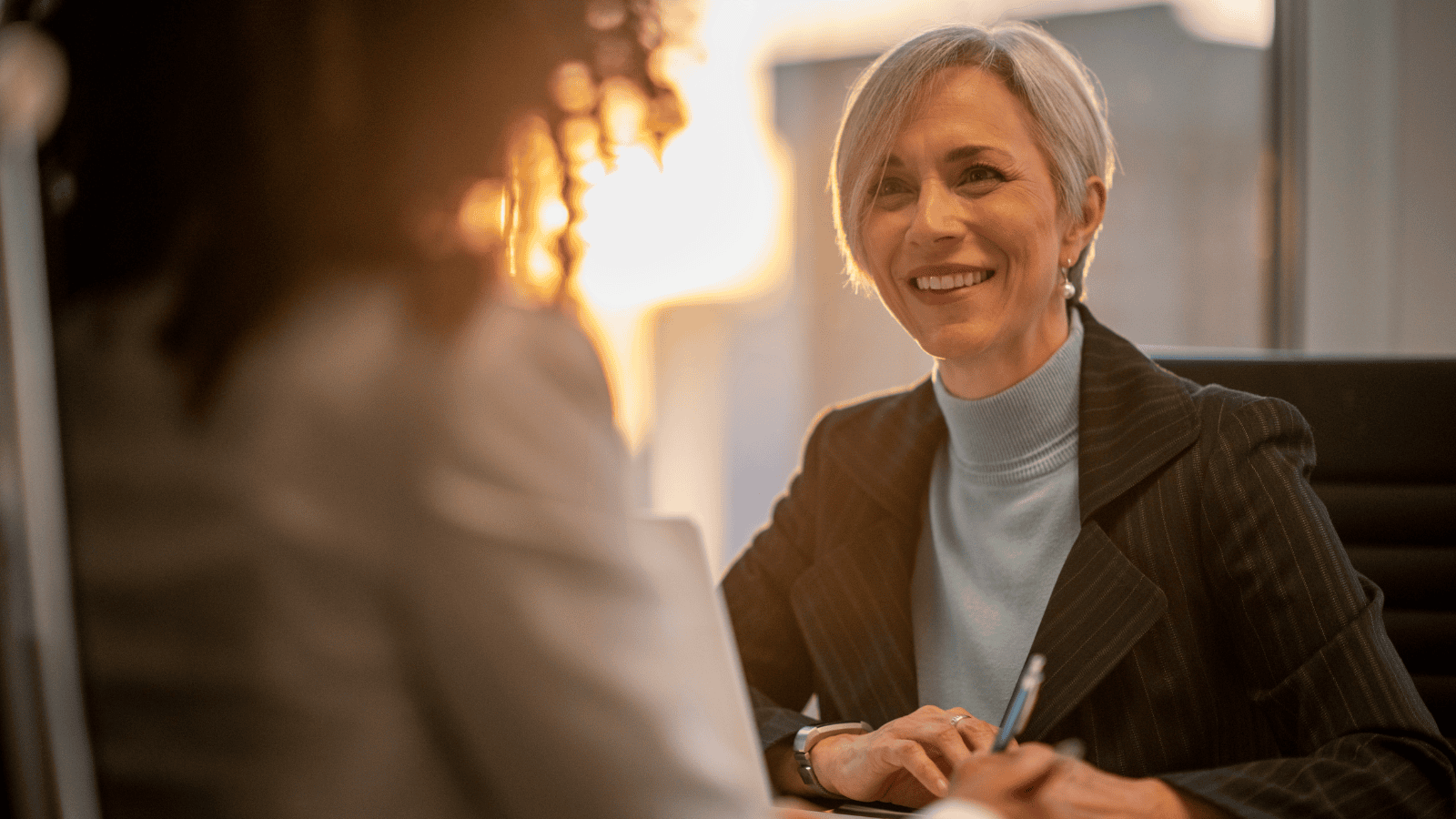 Manager using 9 box grid to discuss employee performance